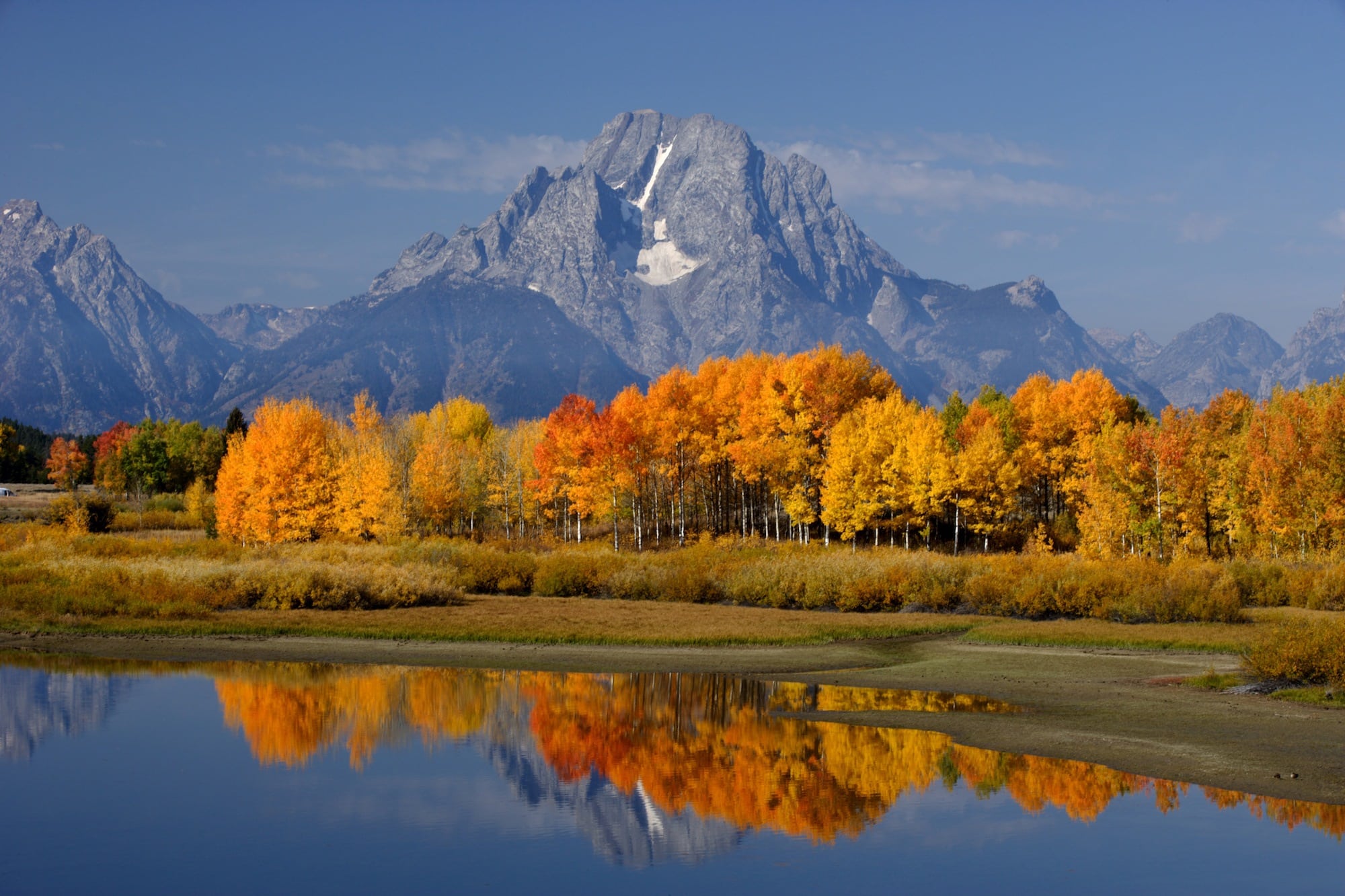 Grand Teton National Park // Discover the best National Parks to visit during fall for the best leaf-peeping vacation. Get tips on hikes, scenic drives, and more.