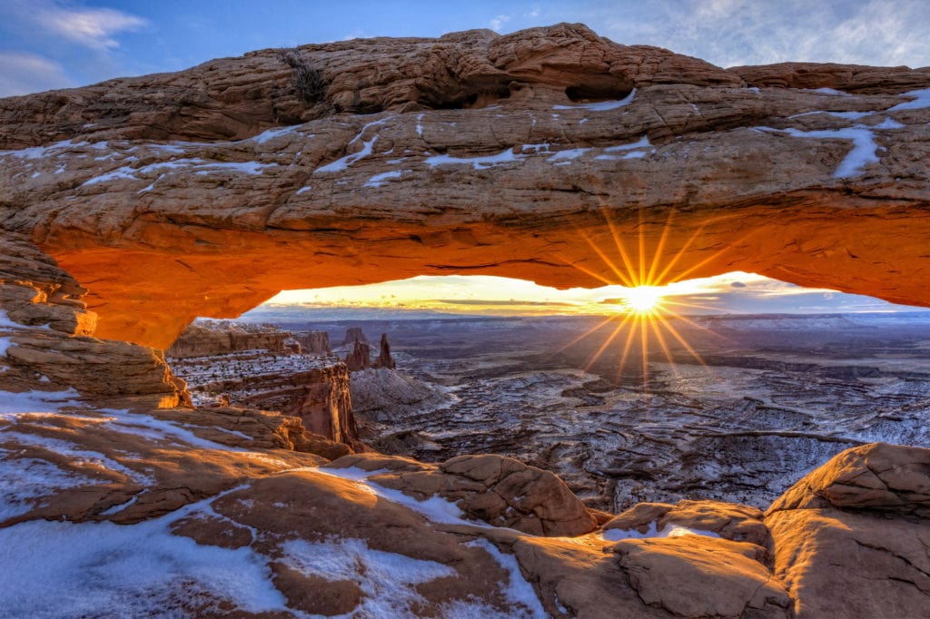Mesa Arch // Explore Utah National Parks with this 9-day road trip itinerary and the best hikes, activities & camping in Zion, Bryce, Capitol Reef, Arches, Canyonlands, and more.