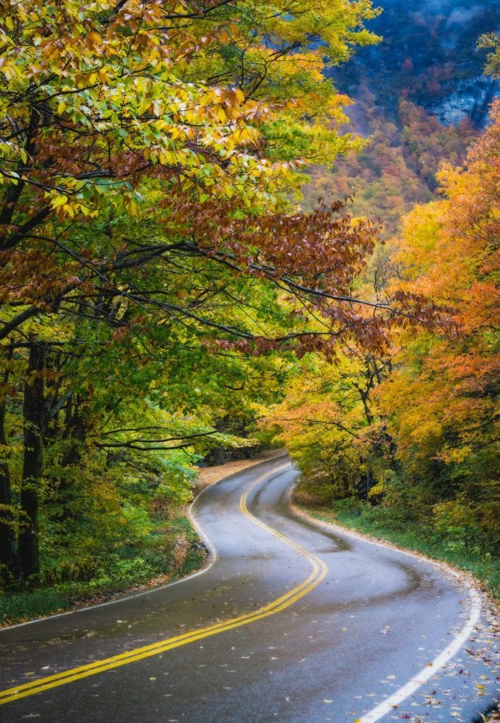 Smuggler's Notch Road // Plan your Vermont Fall Foliage road trip with our guide on where see the best fall colors including scenic leaf-peeping drives and more.