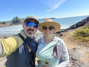 Man and Woman taking selfie on the beach in Tofino